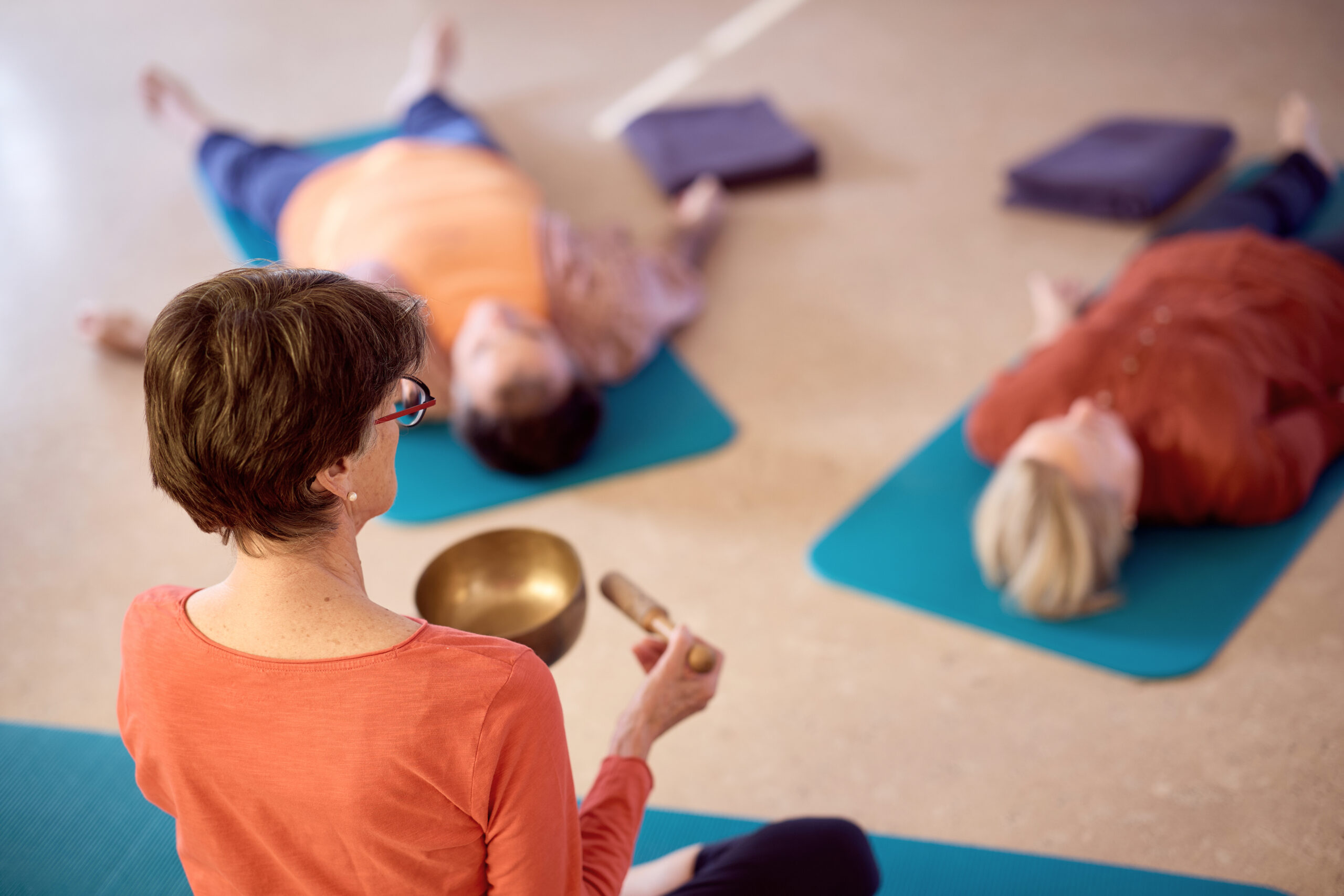 yoga nidra one person is laying
